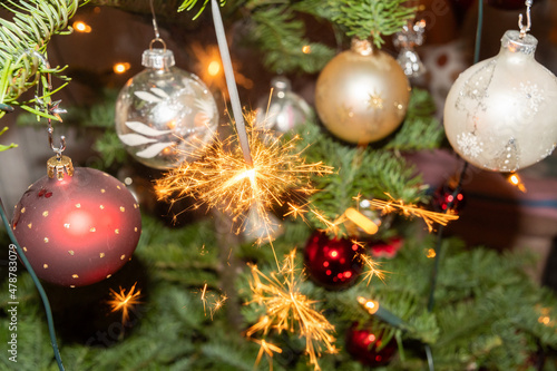 Burning sparkle lights on a christmas tree