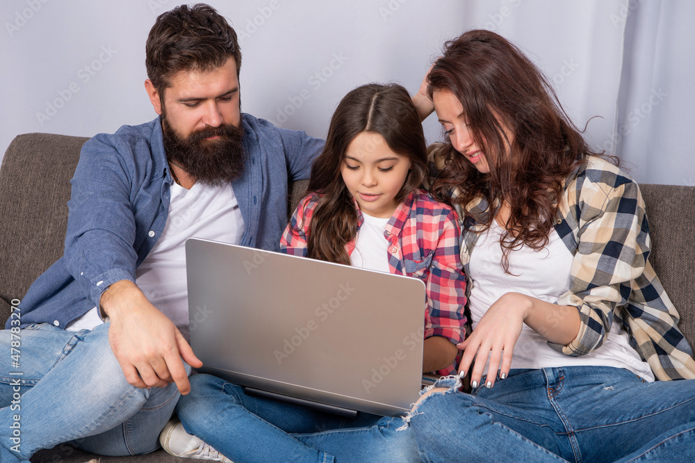 happy parents with kid girl elearning online. mom dad and daughter shopping