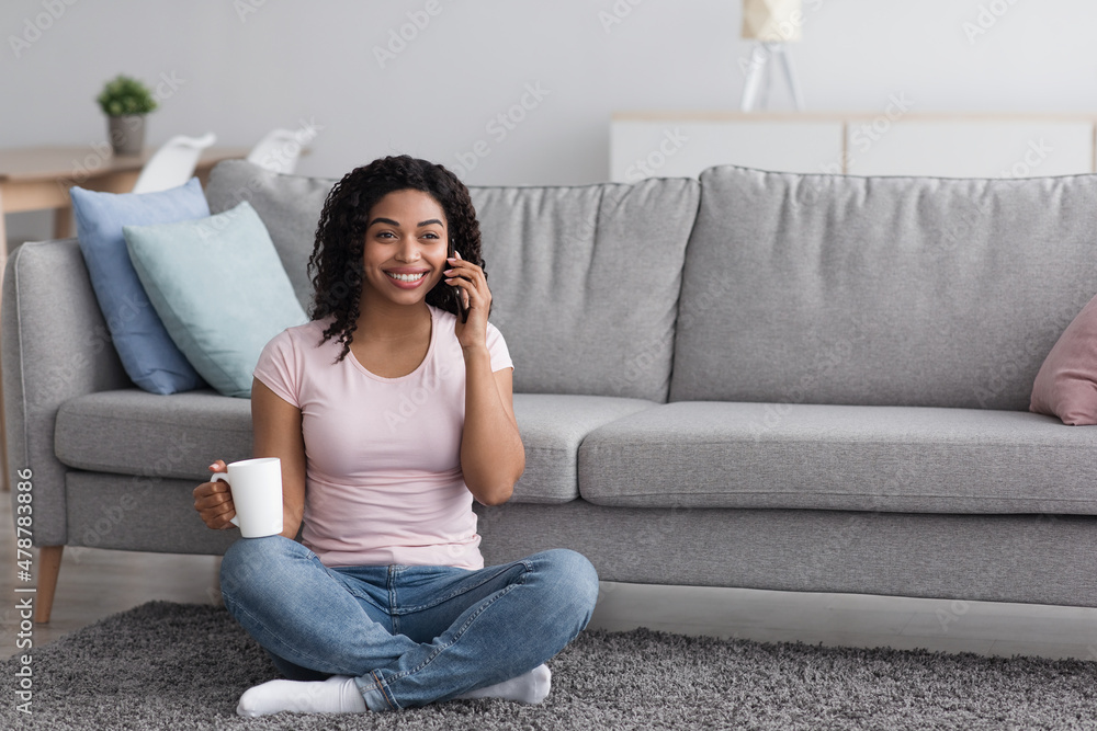 Free time, rest and calls to friend on phone, coffee break at home Free time, rest and calls to friend on phone, coffee break at home