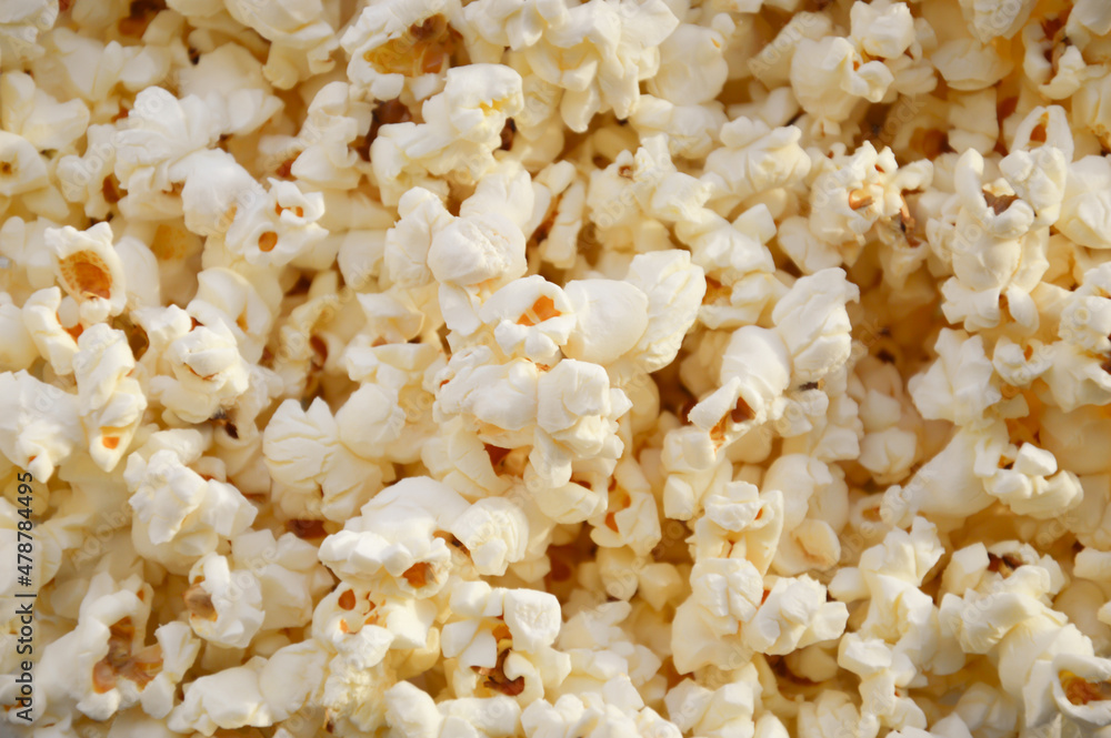 popcorn on a plate. background for popcorn and movie day decoration. popcorn on a plate. background for popcorn and movie day decoration.