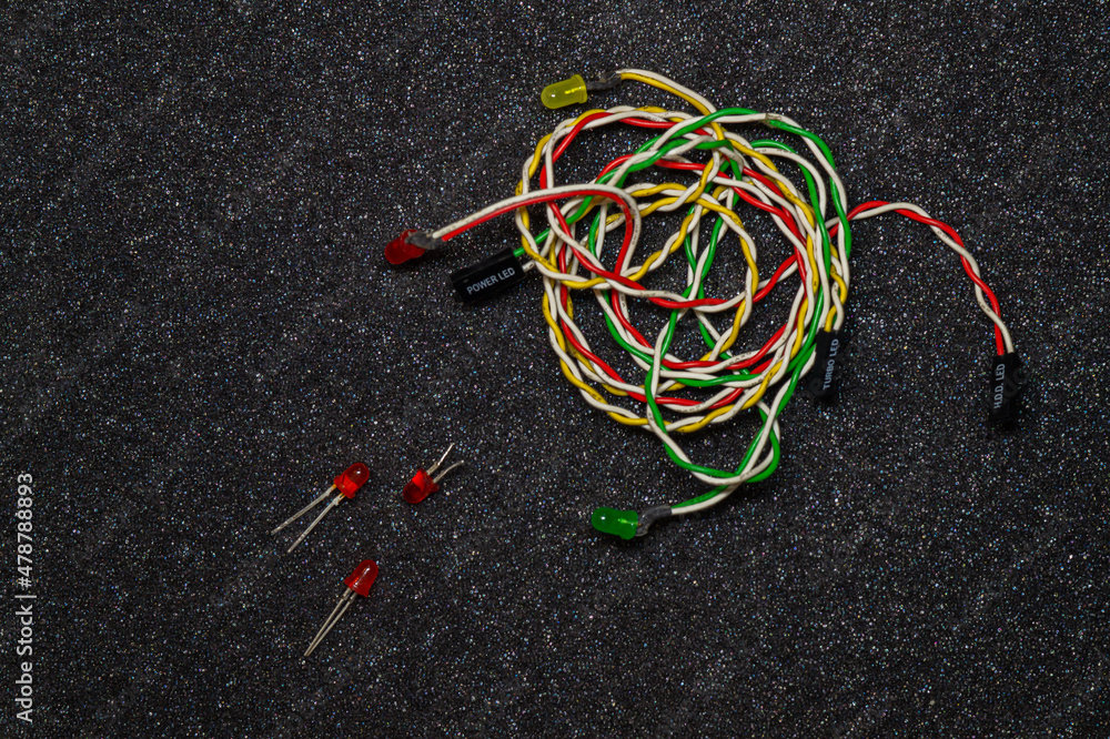 multicolored wires with diodes on a dark background - obrazy, fototapety, plakaty 