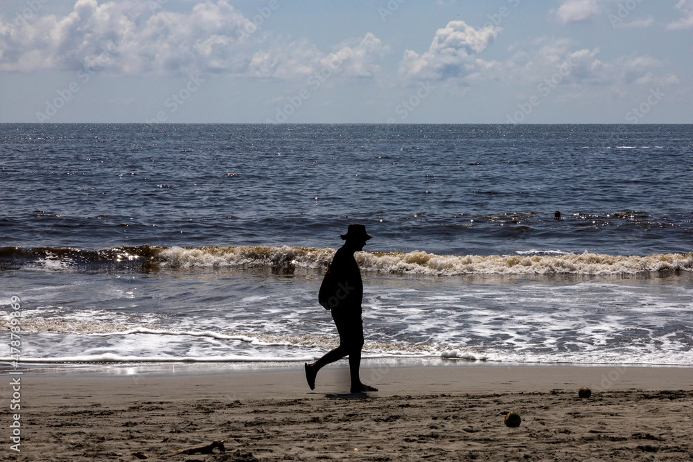 People Silhouettes at the Beach in Costa Rica People Silhouettes at the Beach in Costa Rica