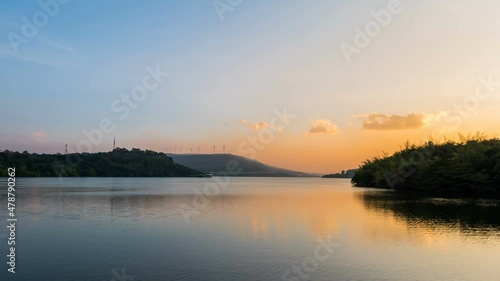 Wallpaper Mural Time lapse Landscape of Mountain and lake scenery with wind turbine and motorway at sunrise at Lam Ta Khong dam, Nakhon Ratchasima, Thailand Torontodigital.ca