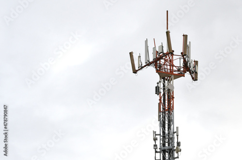 Detail of the telecommunication tower. Telecommunication tower with antennas and antennas for microwaves, 4g radio links and distribution of the 5g generation of various mobile telephony, radio and tv photo