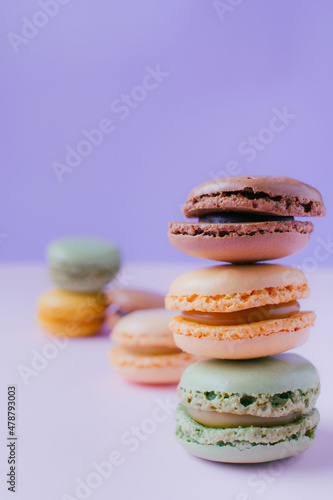 Fototapeta Naklejka Na Ścianę i Meble -  Macarons dessert on pastel tones background. Copy space.