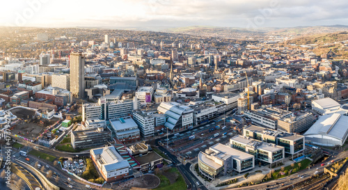 Aerial view of Sheffield city centre skyline at sunset photo