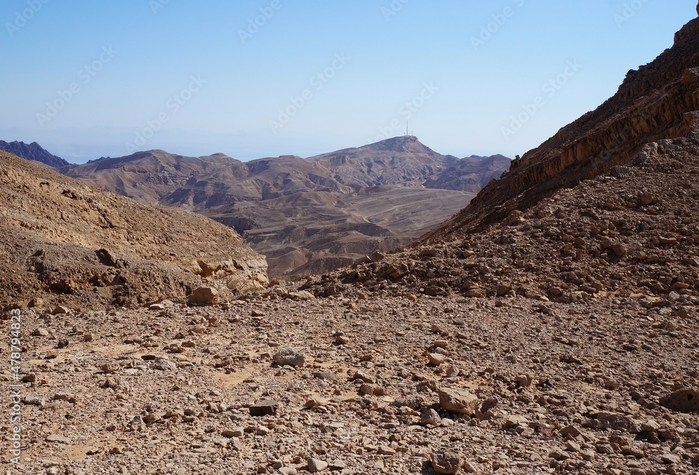 Hiking on the Hurba Bodeda way in the mountains near Eilat, Israel with view of Aqaba