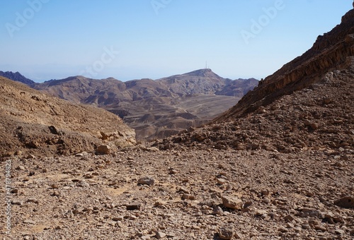 Hiking on the Hurba Bodeda way in the mountains near Eilat, Israel with view of Aqaba