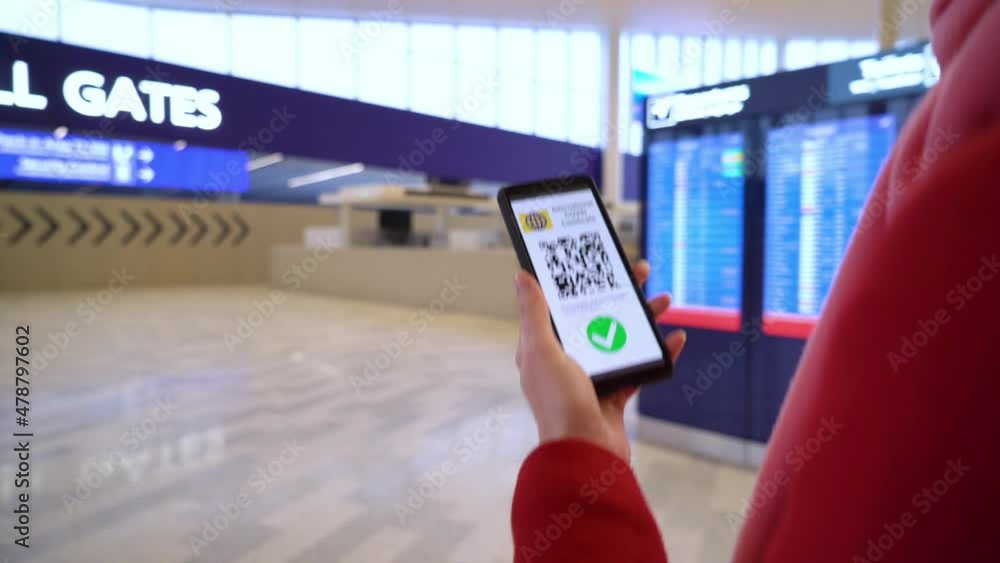 Female passenger using international digital health ...