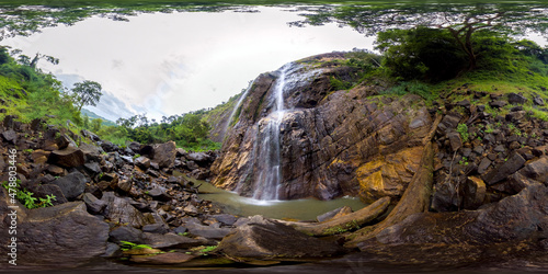 Tropical waterfall falls from the mountain cliff. Diyaluma Falls, Sri Lanka. Virtual Reality 360.