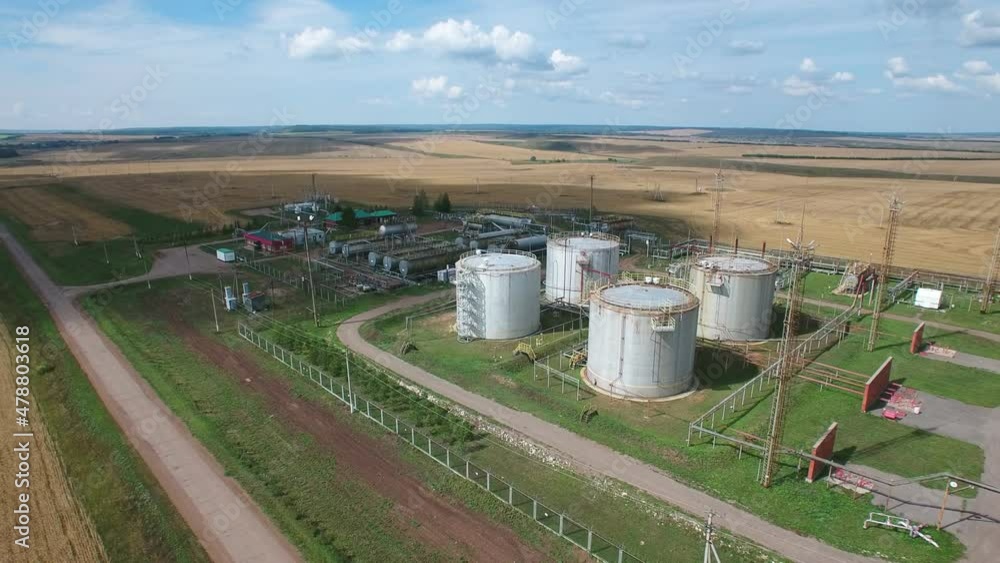 Aerial orbit panorama of fuel and crude oil storage facilities. The oil and gas industry. Aerial orbit panorama of fuel and crude oil storage facilities. The oil and gas industry.