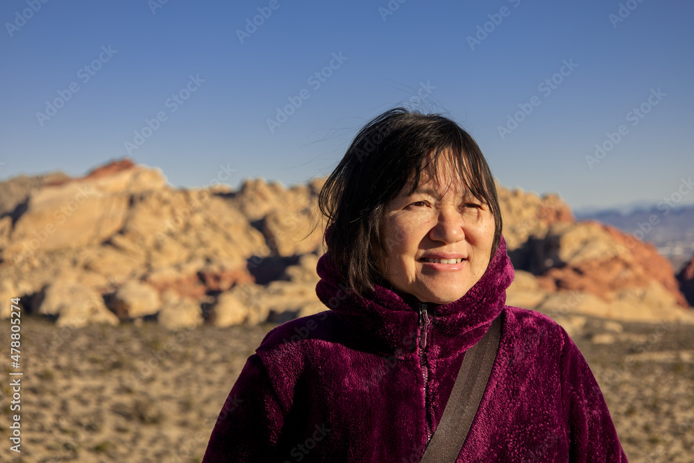 Woman Smiling In Front of Las Vegas Red Rock Canyon Woman Smiling In Front of Las Vegas Red Rock Canyon