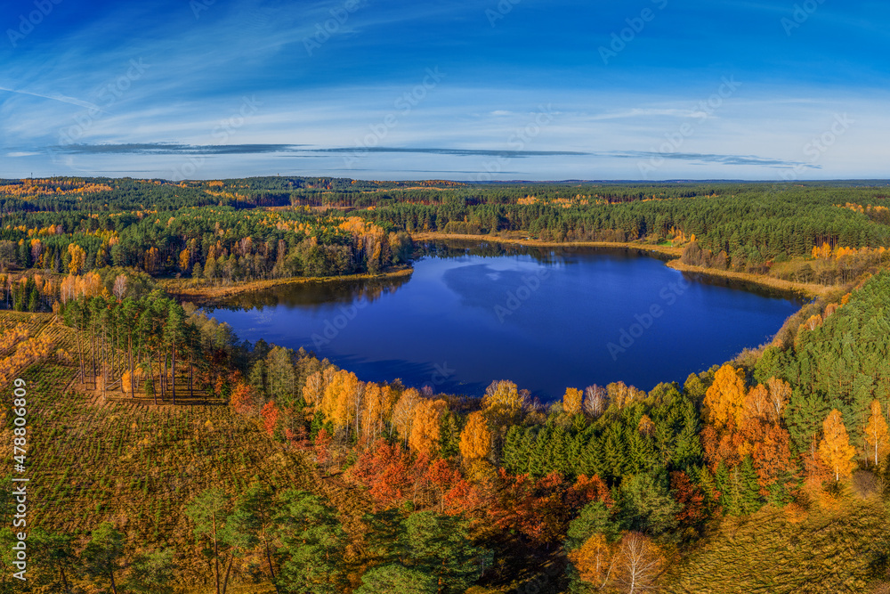 The autumn landscape of Masuria, the land of a thousand lakes in north-eastern Poland The autumn landscape of Masuria, the land of a thousand lakes in north-eastern Poland