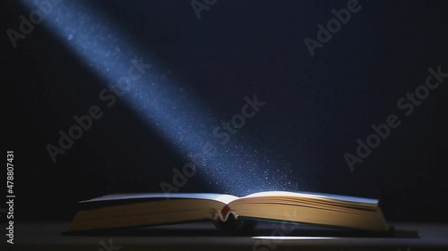 footage of book dust dark background 