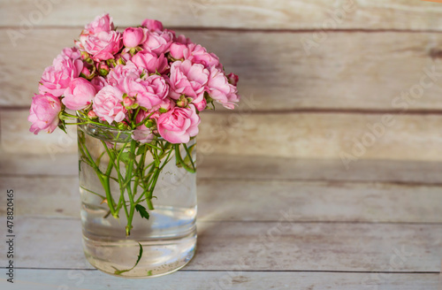 Wallpaper Mural Beautiful Pink Roses Bouquet in Vase  on a Wooden Background   Torontodigital.ca