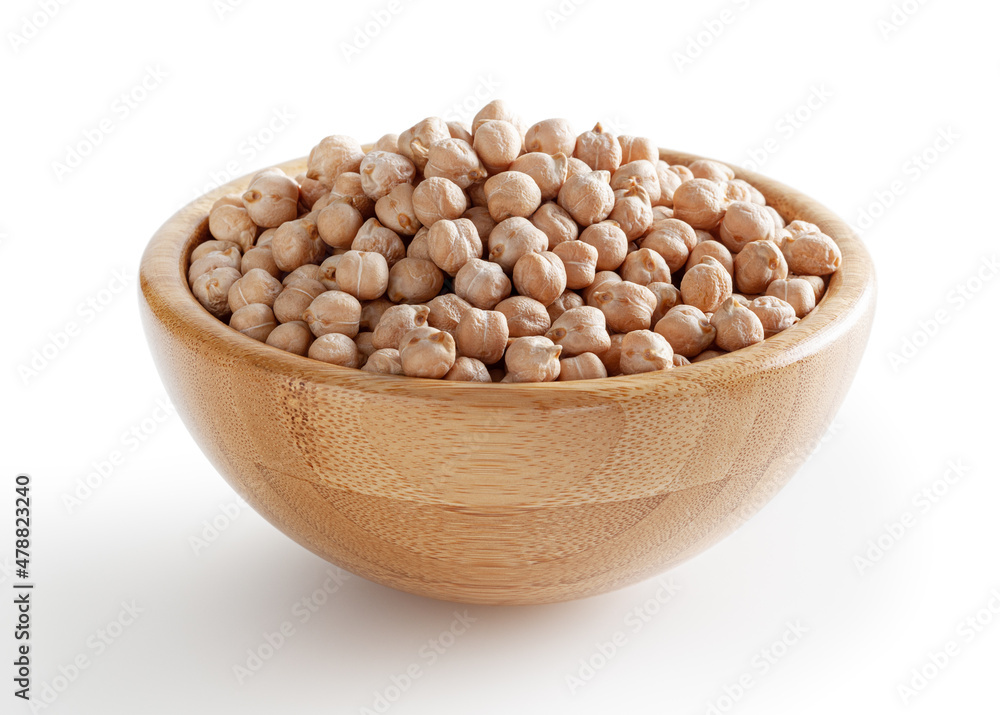 Uncooked chick beans in wooden bowl isolated on white background with clipping path