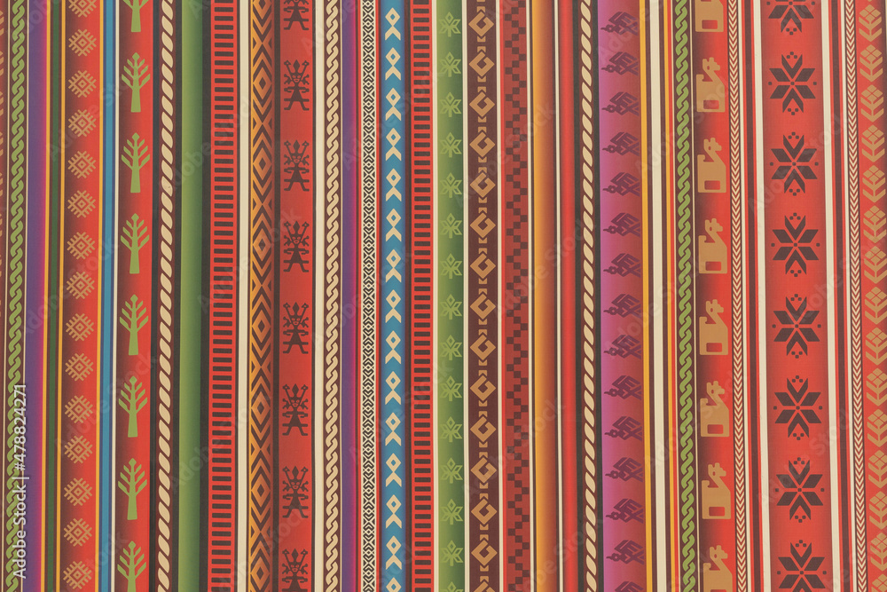 Close up to traditional Peru colorful fabric pattern, unique Peruvian hand made style. Close up to traditional Peru colorful fabric pattern, unique Peruvian hand made style.