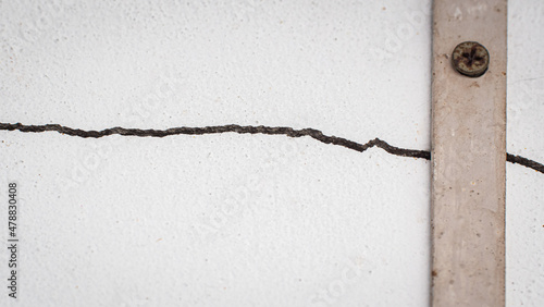 Cracks on the wall. The cra...