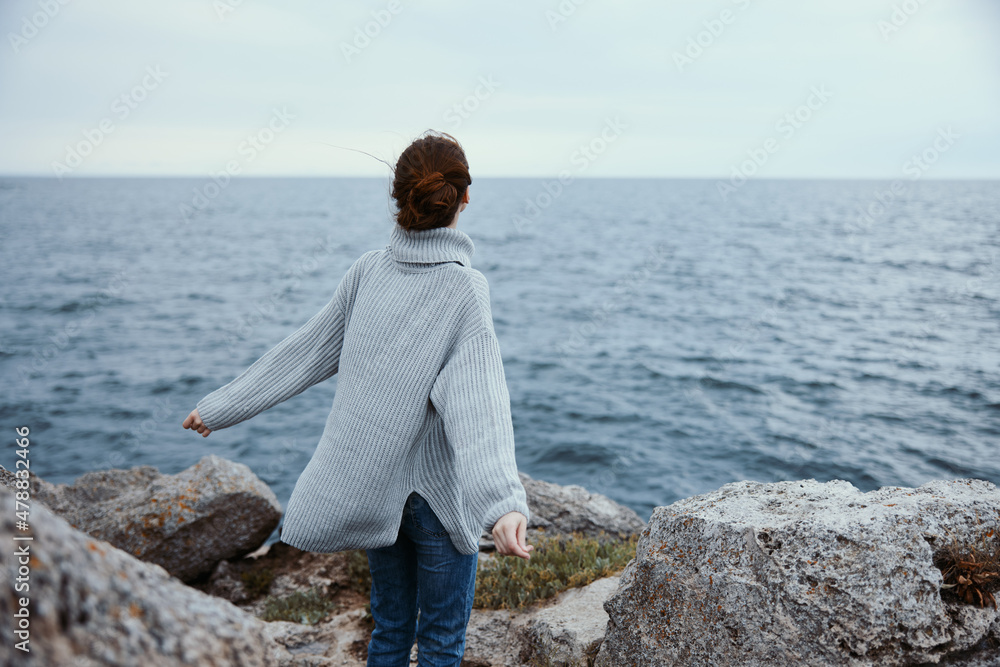 portrait of a woman nature rocks coast landscape Ocean female relaxing