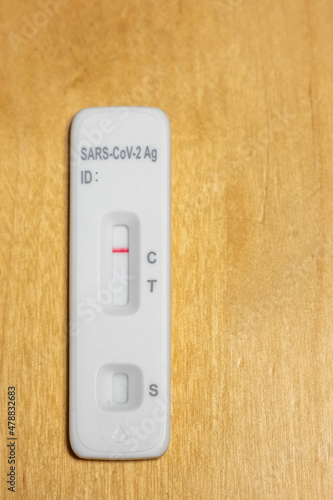 Negative covid-19 auto test with one red line appearing on the test cassette