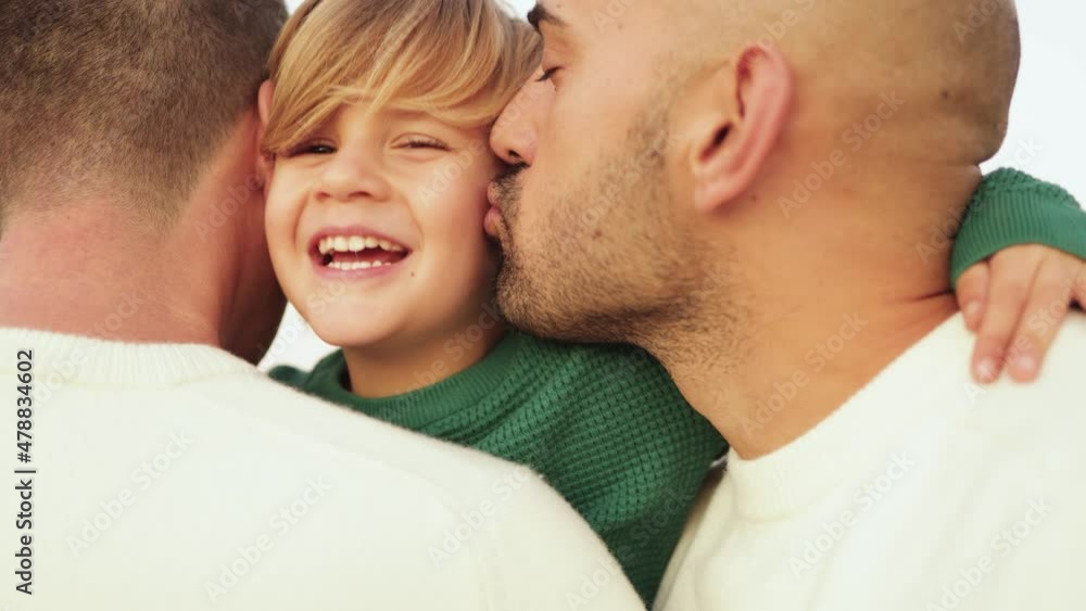 Gay male couple having tender moment with son boy outdoor - LGBT family love concept Gay male couple having tender moment with son boy outdoor - LGBT family love concept