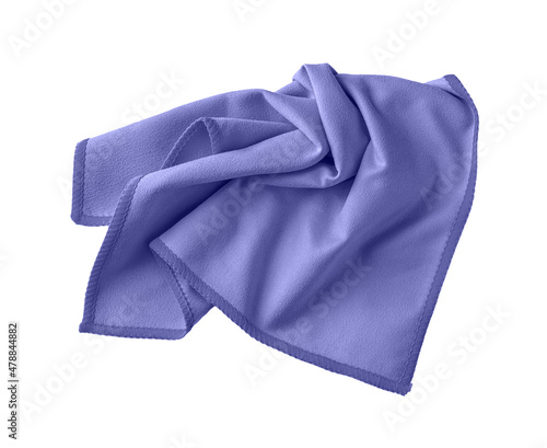 Crumpled blue violet microfiber cloth isolated on white background. Soft micro fiber napkin for cleaning objects and surfaces in trendy color of the year 2022 very peri. Housework, cleaning.
