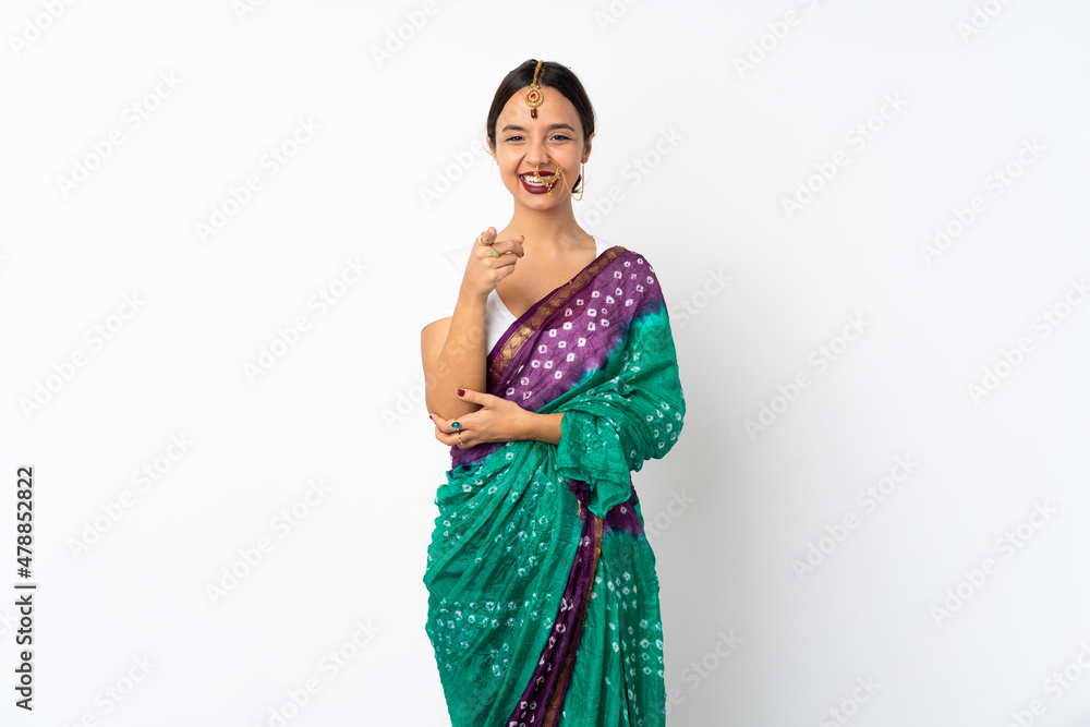 Young indian woman isolated on white background surprised and pointing front Young indian woman isolated on white background surprised and pointing front