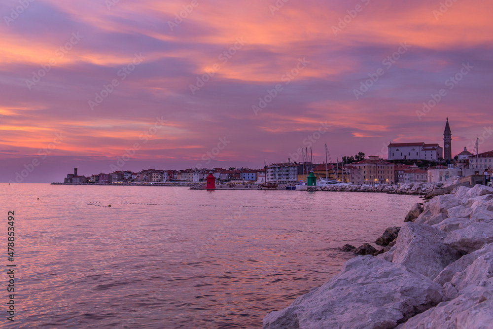 Beautiful view of Piran in Slovenia during sunset with colorful clouds