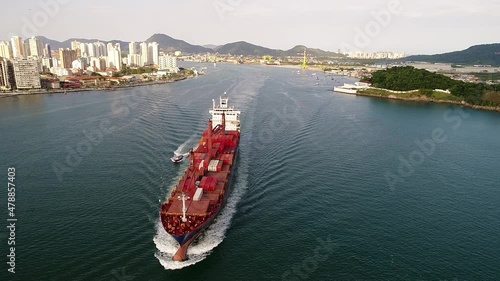 SANTOS, SÃO PAULO, BRAZIL - 05, 2018: Cargo ship leaving the Port of Santos