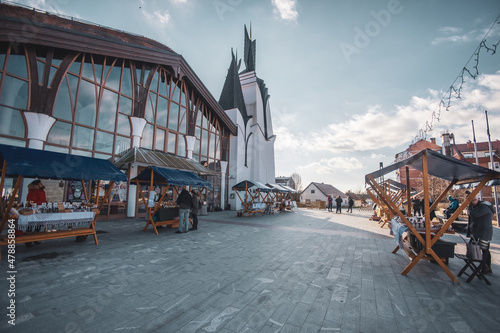 The open-air market, where people are selling and trading craft goods photo