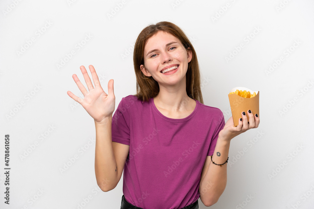 Young English woman holding fried chips isolated on white background counting five with fingers Young English woman holding fried chips isolated on white background counting five with fingers