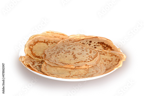 Delicious pancakes on a plate on a white background are ready to eat