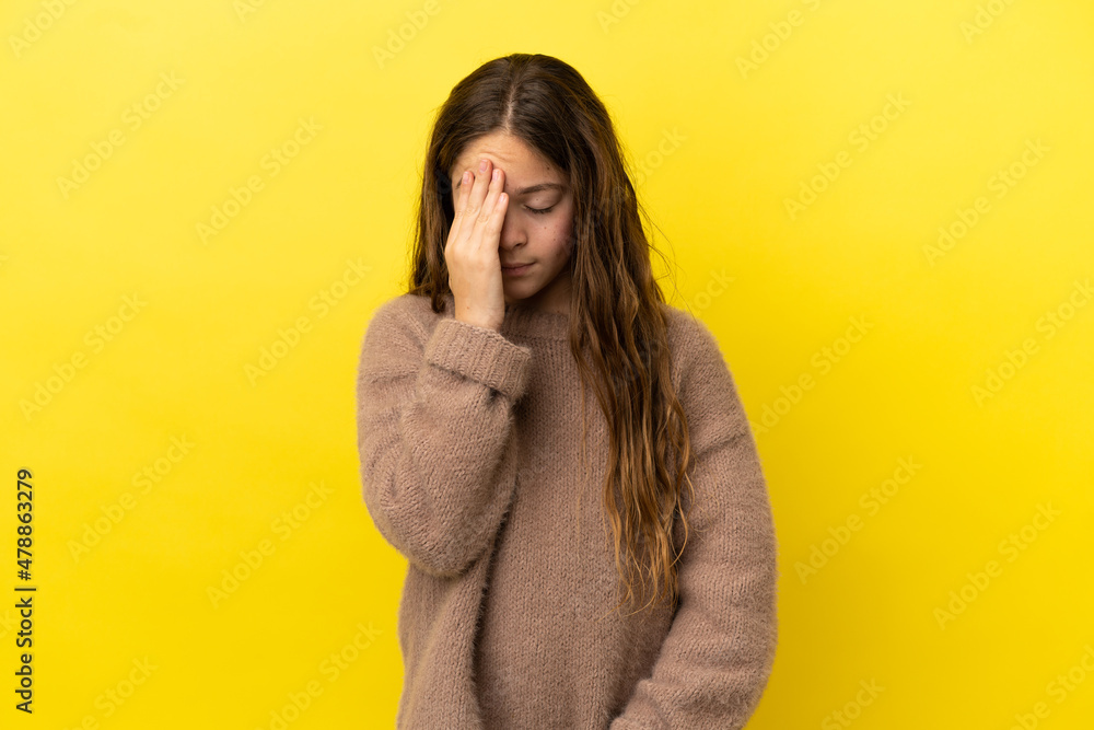 Little caucasian girl isolated on yellow background with headache Little caucasian girl isolated on yellow background with headache