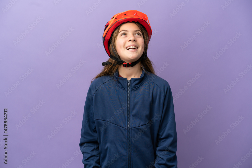 Little caucasian girl isolated on purple background laughing Little caucasian girl isolated on purple background laughing