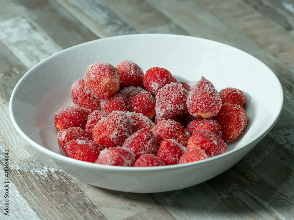 frozen strawberries in a white bowl on a wooden table, a lot of details, macro photo frozen strawberries in a white bowl on a wooden table, a lot of details, macro photo