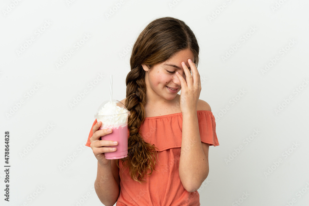 Little caucasian girl with strawberry milkshake isolated on white background laughing Little caucasian girl with strawberry milkshake isolated on white background laughing