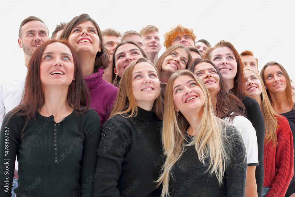 group of happy young people looking up group of happy young people looking up