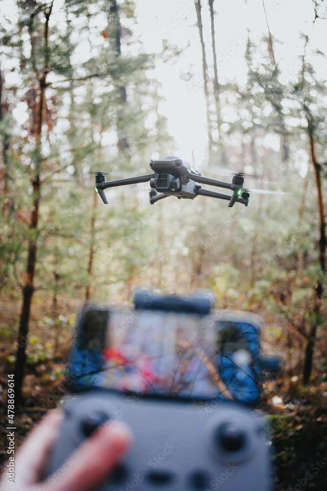 Flying drone in countryside in forest Flying drone in countryside in forest