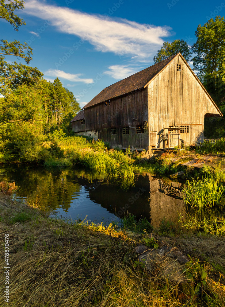 Old German Barn next to lake in the town of Beratzhausen Bavaria Germany with copy space Old German Barn next to lake in the town of Beratzhausen Bavaria Germany with copy space