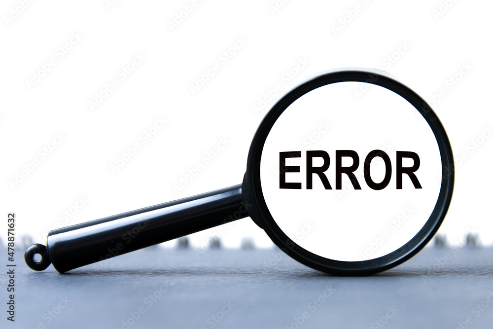 look closely and Error with a magnifying glass. business concept. magnifying glass on the gray background look closely and Error with a magnifying glass. business concept. magnifying glass on the gray background