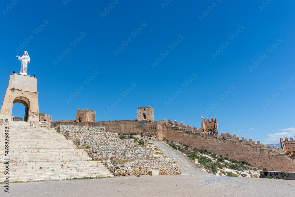 Jayrán Wall (a Moorish wall), statue of Jesus Christ  and Cerro San Cristobal Hill in Almeria, Andalusia, Spain - Europe