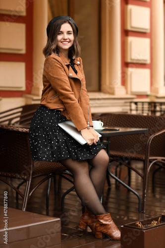 Fashionable woman with mode...