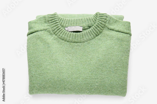 Green male sweater on white background