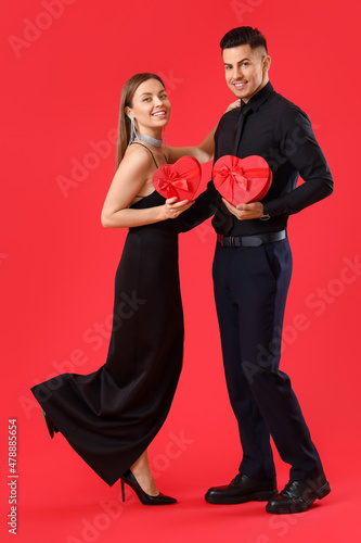 Happy young couple with gif...