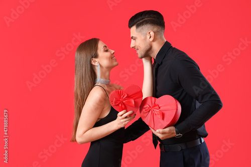 Happy young couple with gif...