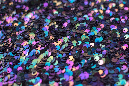 Multicolored shiny background of round sequins