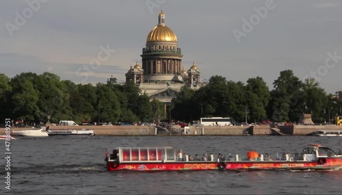 St. Petersburg, Russia - the 9th of June 2021, The view of the Saint Isaac's Cathedral, Admiralty spire and the building complex of the former Senate and Synod from the other bank of the Neva river