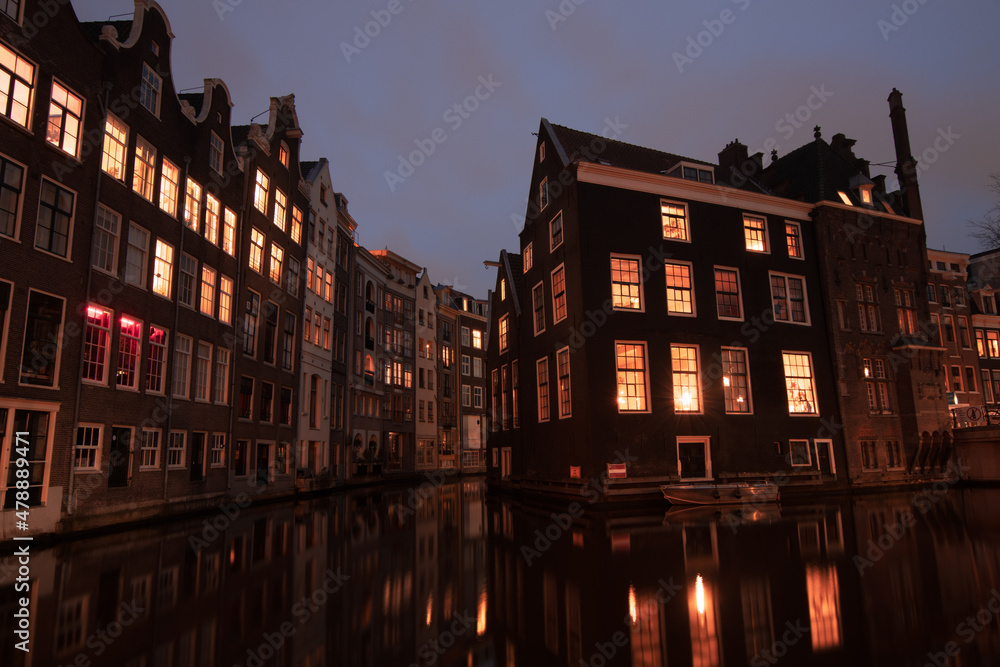 Buildings along the Canals in Amsterdam at Night.