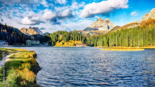 Astonishing view of popular travel destination mountain lake Antorno in autumn. photo