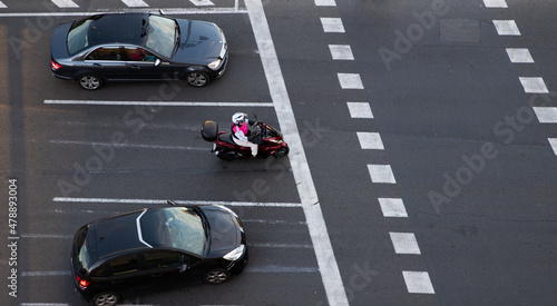 aeriel view of street traffic cars and motocycle